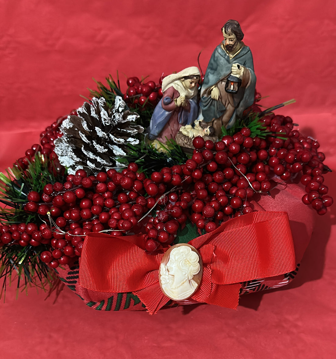 Bon bon natalizio con natività e cammeo